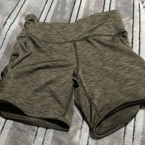Green biker shorts
